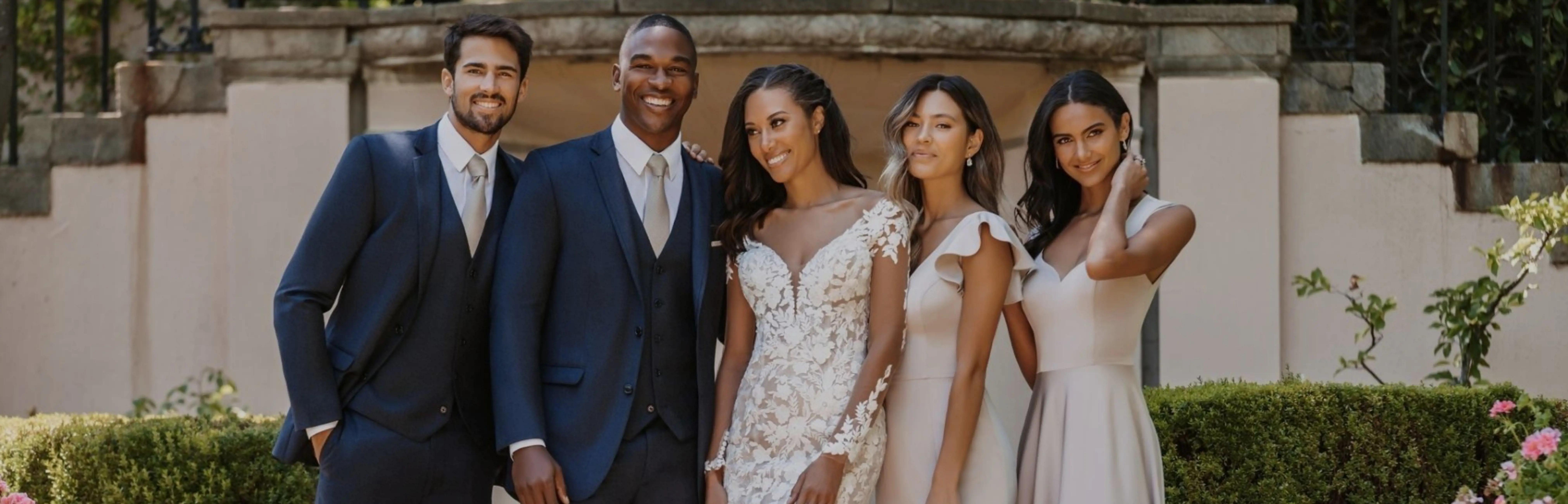 Photo of Michelle's Bridal & Tuxedo Bride, groom and bridesmaids