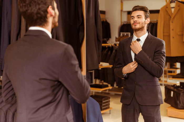 HOW TO TELL IF A SUIT FITS. Desktop Image