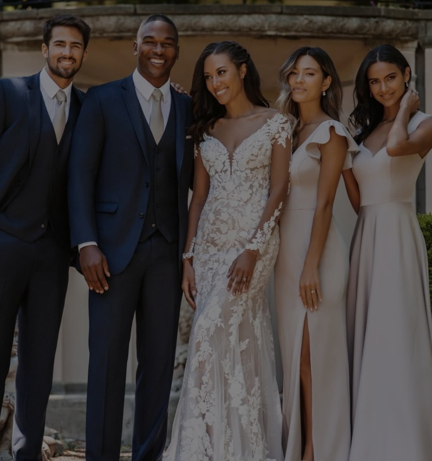 Photo of Michelle's Bridal & Tuxedo Bride, groom and bridesmaids