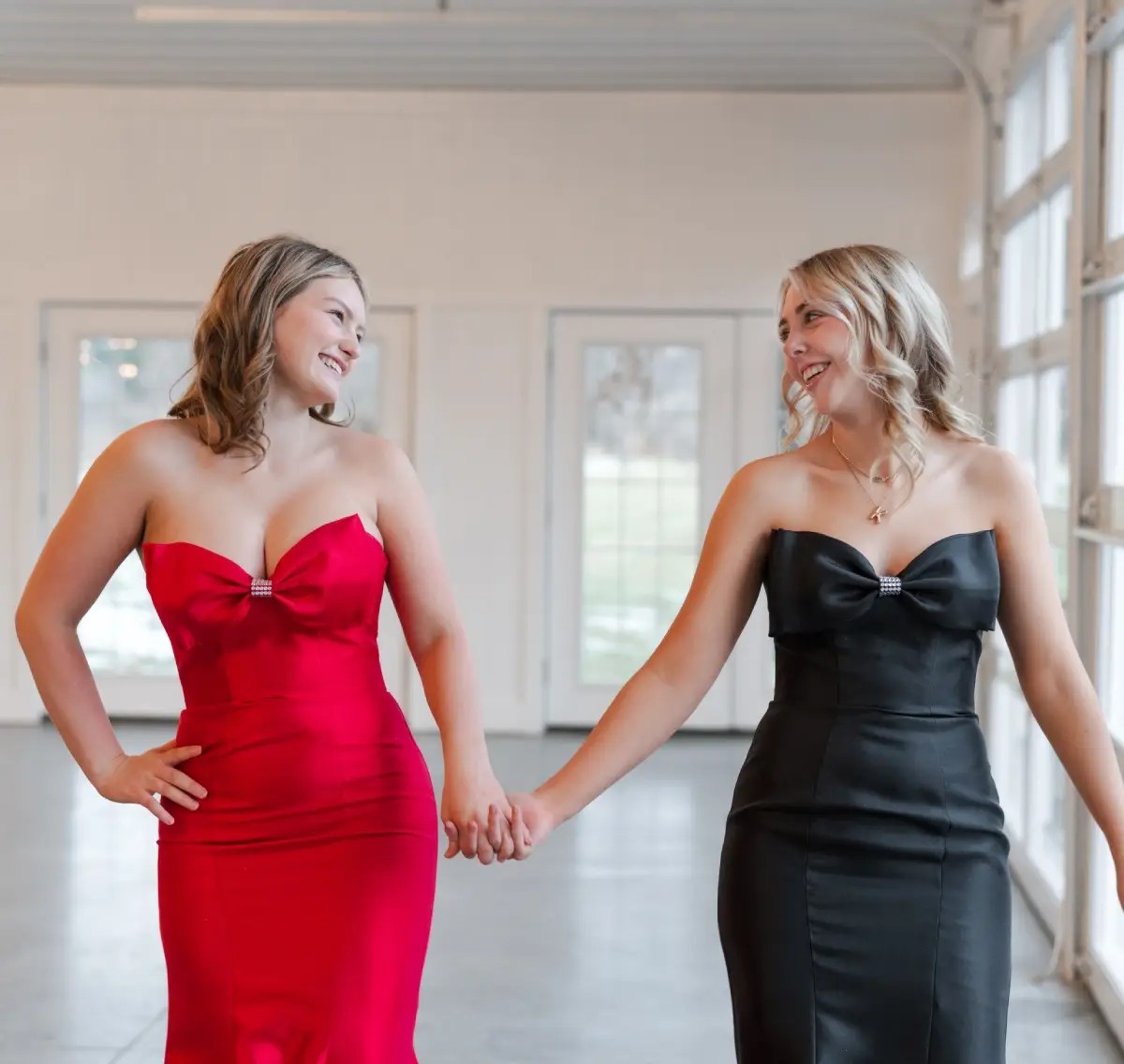 Luxe For Less Collection models wearing prom gowns